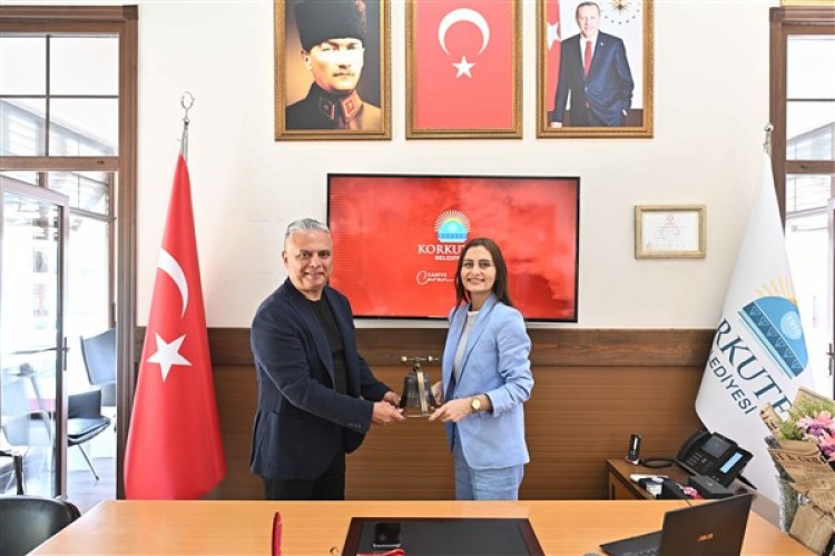 Bakan Uysal'dan Saniye Caran'a ziyaret